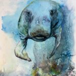 Watercolor painting of a manatee swimming forward, detailed with expressive features and rendered in rich washes of ocean blue, green, and deep violet with bubble-like textures.